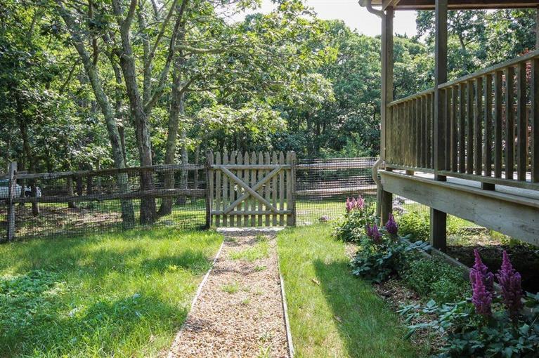 73 Pennywise Path Edgartown, MA 02539 - Photo 6 of 26 a garden view with a seating space