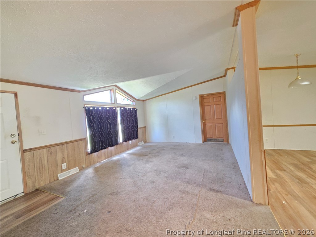 124 Franklin Road Raeford, NC 28376 - Photo 6 of 15 a view of a big room with closet and entryway