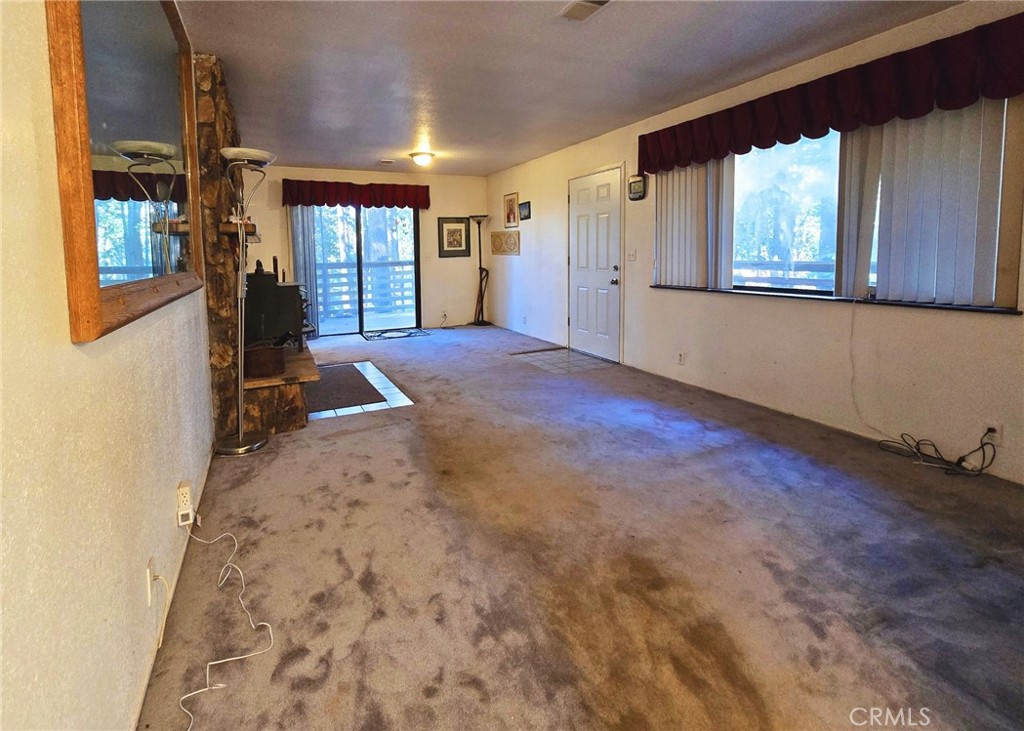 38 Weiss Hill Road Oroville, CA 95966 - Photo 11 of 27 an empty room with windows