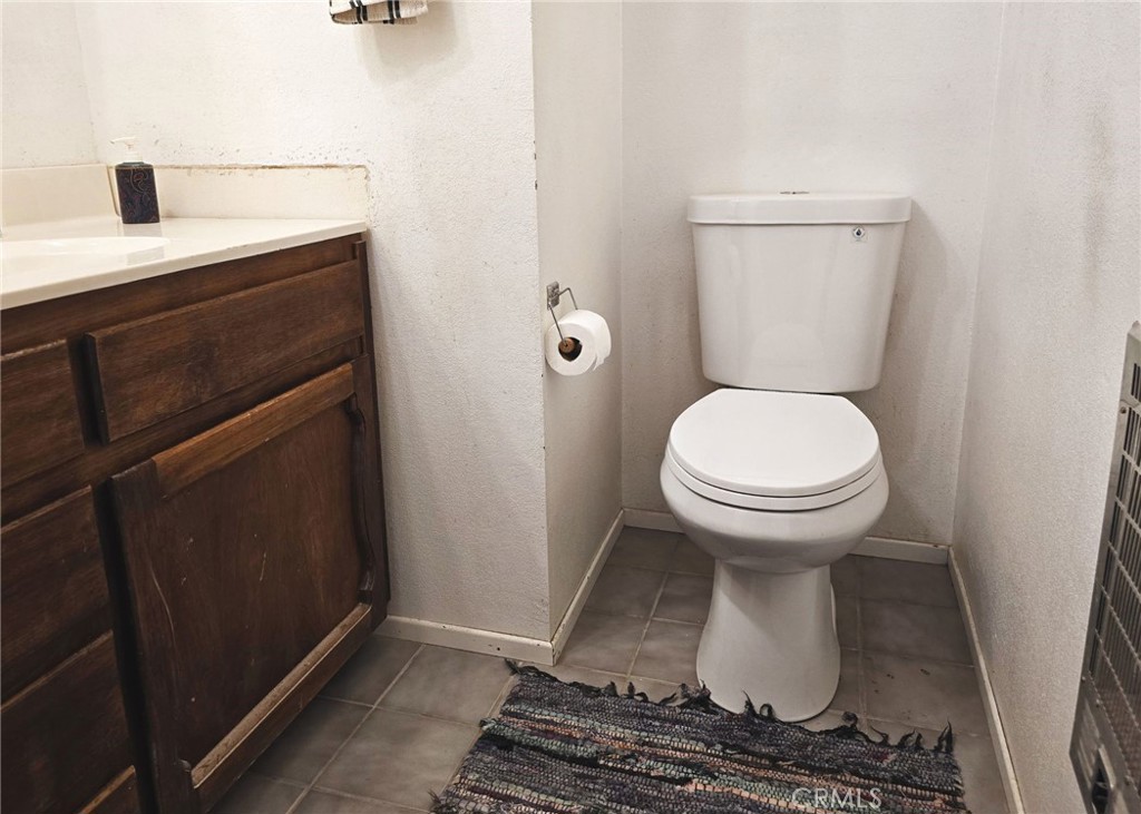38 Weiss Hill Road Oroville, CA 95966 - Photo 17 of 27 a bathroom with a sink and a toilet
