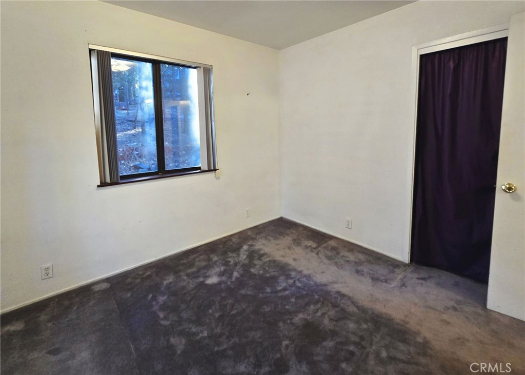 38 Weiss Hill Road Oroville, CA 95966 - Photo 19 of 27 an empty room with windows