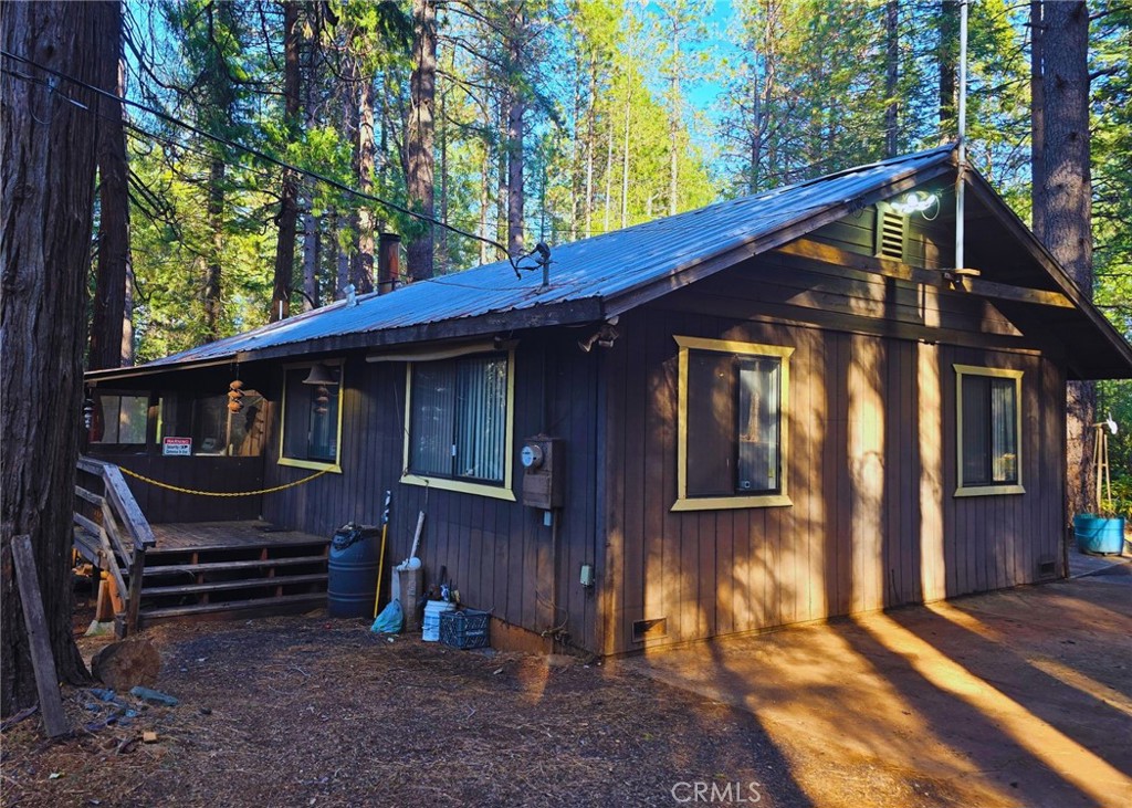 38 Weiss Hill Road Oroville, CA 95966 - Photo 2 of 27 a view of house with a small yard and wooden fence