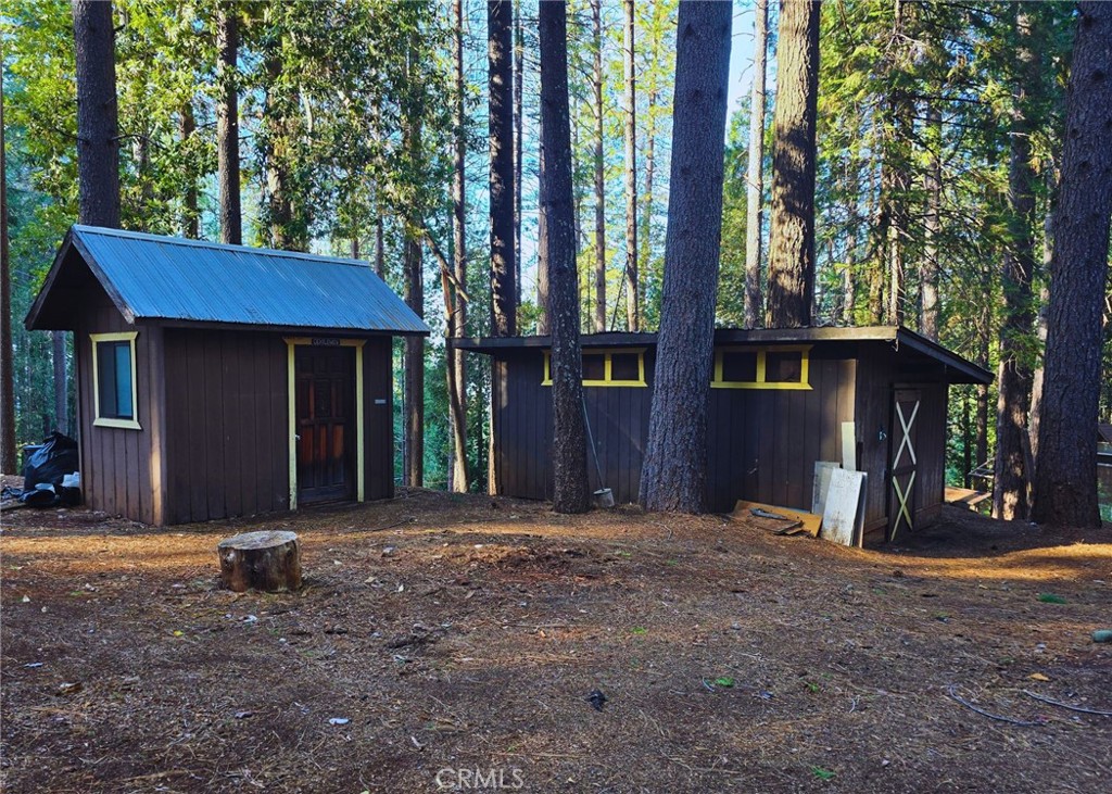 38 Weiss Hill Road Oroville, CA 95966 - Photo 3 of 27 a view of a house with backyard and garden
