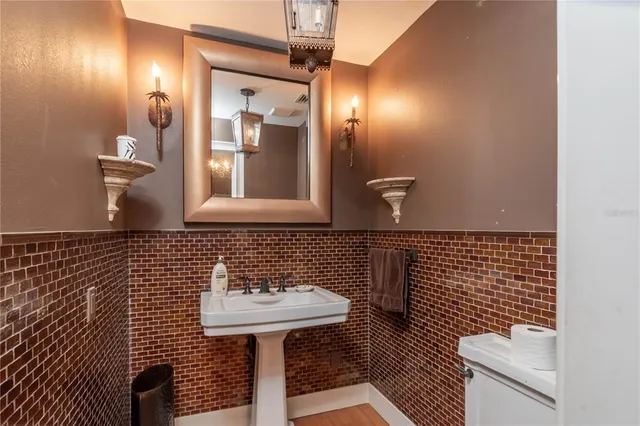 a view of a park with large trees