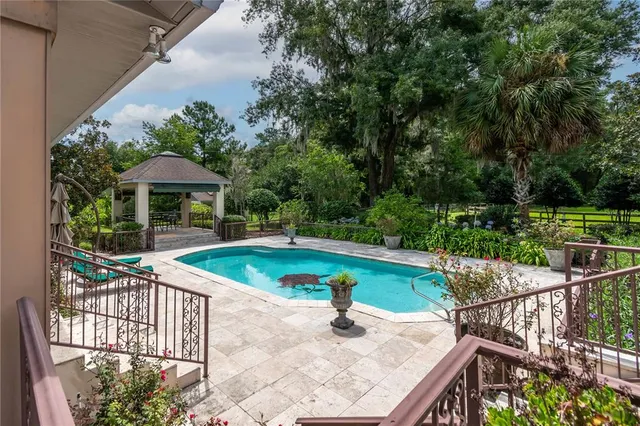 a view of an empty room with windows
