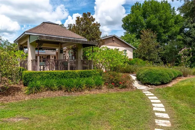 a view of residential houses with outdoor space