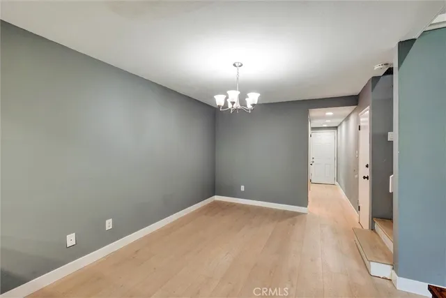 a kitchen with a sink and large window