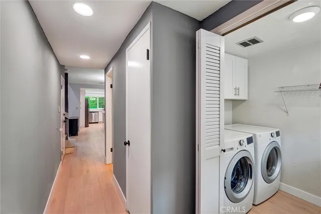 a view of an empty room with stairs