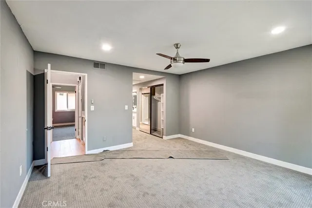a bathroom with a double vanity sink mirror and shower