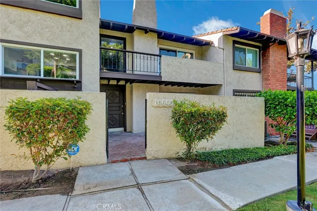 a kitchen with a stove a sink and a refrigerator