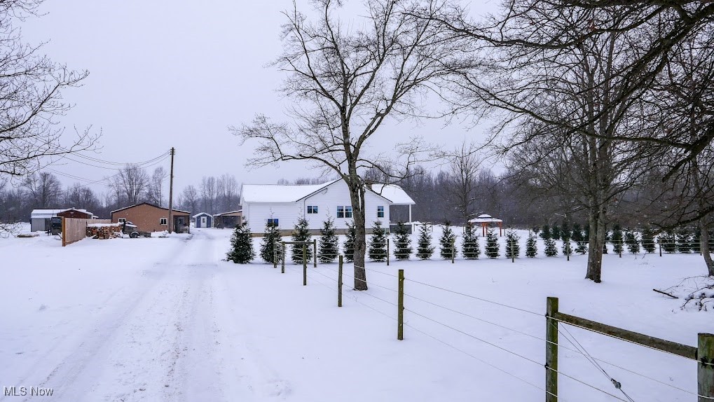 10622 Reynolds Road West Farmington, OH 44491 - Photo 1 of 32 View of yard covered in snow
