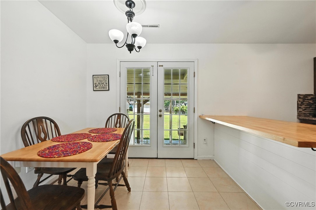 1593 Baxter Road Prince George, VA 23875 - Photo 11 of 48 a view of a dining room with furniture window and outside view