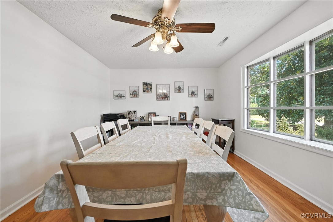 1593 Baxter Road Prince George, VA 23875 - Photo 12 of 48 a living room with furniture and a window