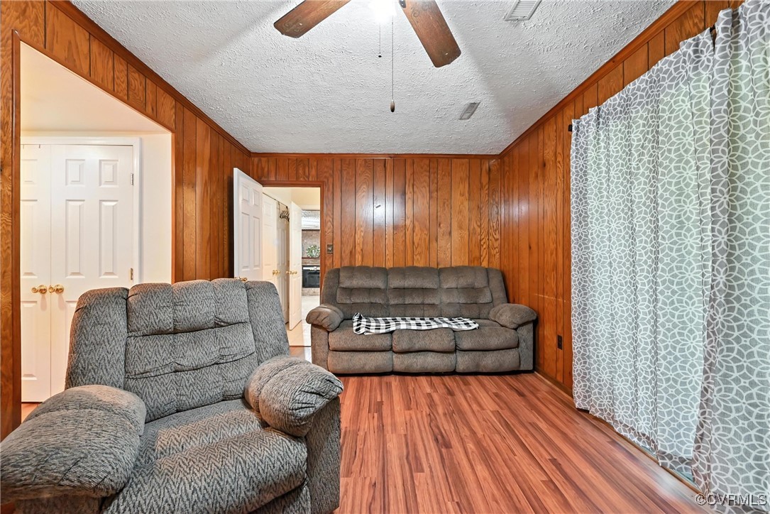 1593 Baxter Road Prince George, VA 23875 - Photo 18 of 48 a view of livingroom with furniture and wooden floor