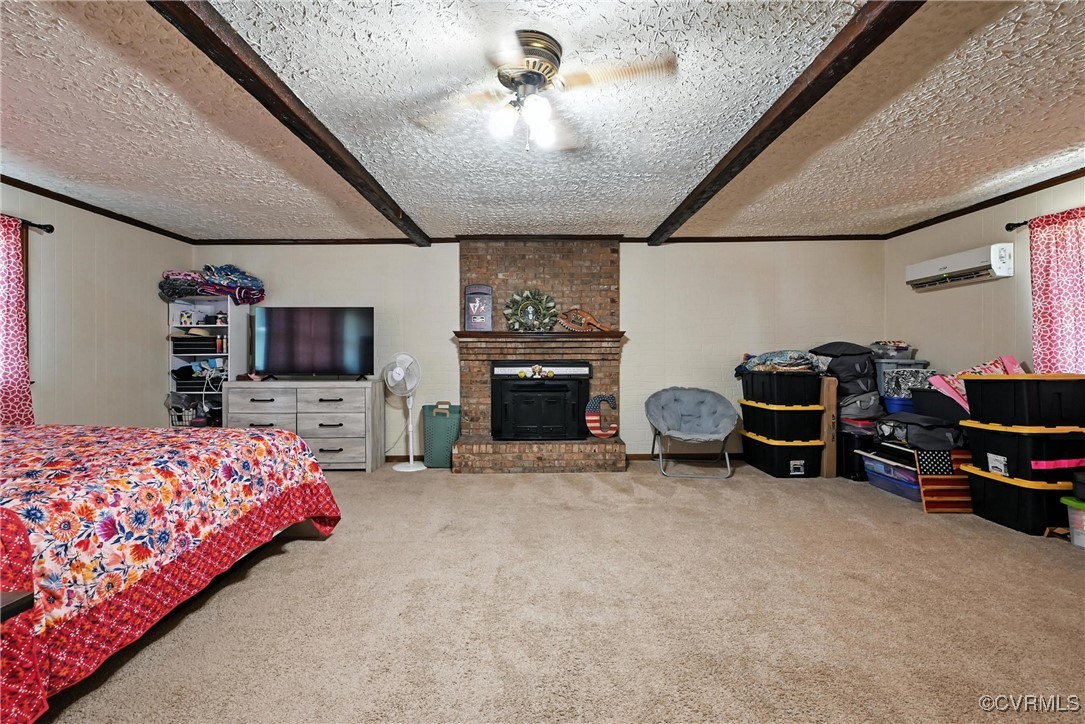 1593 Baxter Road Prince George, VA 23875 - Photo 22 of 48 a bedroom with furniture and a fireplace