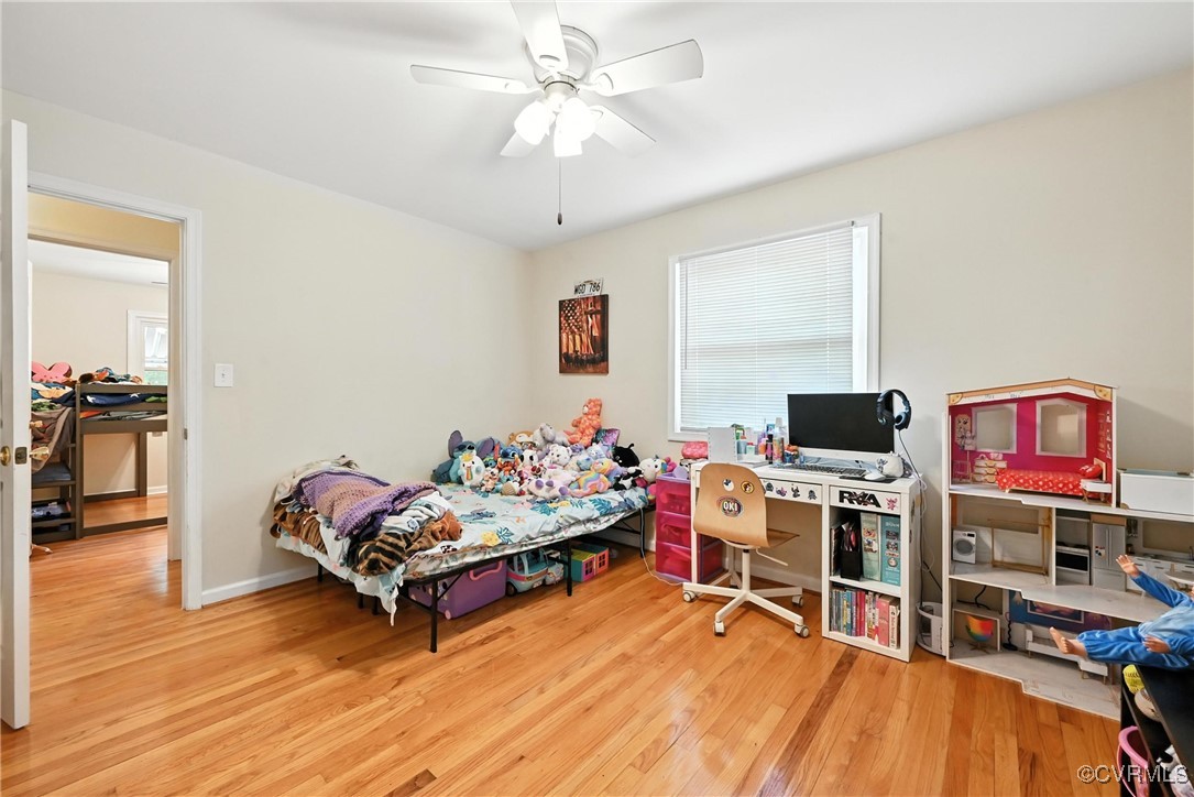 1593 Baxter Road Prince George, VA 23875 - Photo 26 of 48 a living room with furniture and a flat screen tv