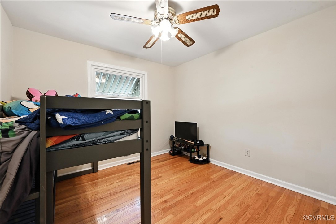 1593 Baxter Road Prince George, VA 23875 - Photo 29 of 48 a living room with furniture and a fireplace