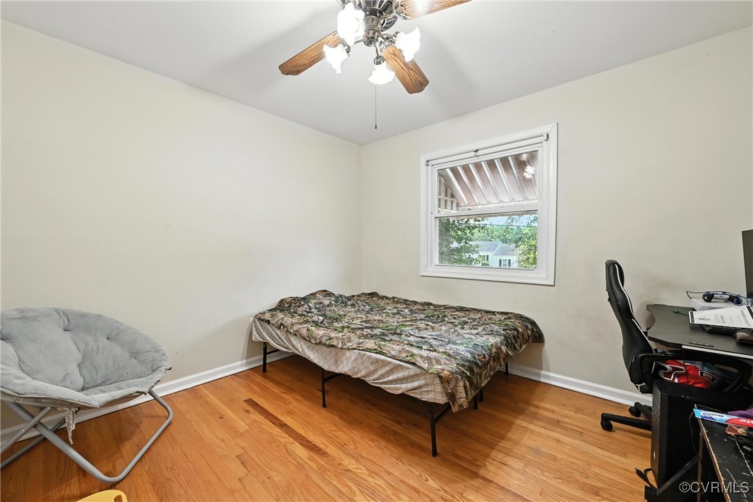 1593 Baxter Road Prince George, VA 23875 - Photo 32 of 48 a bedroom with a bed and a window