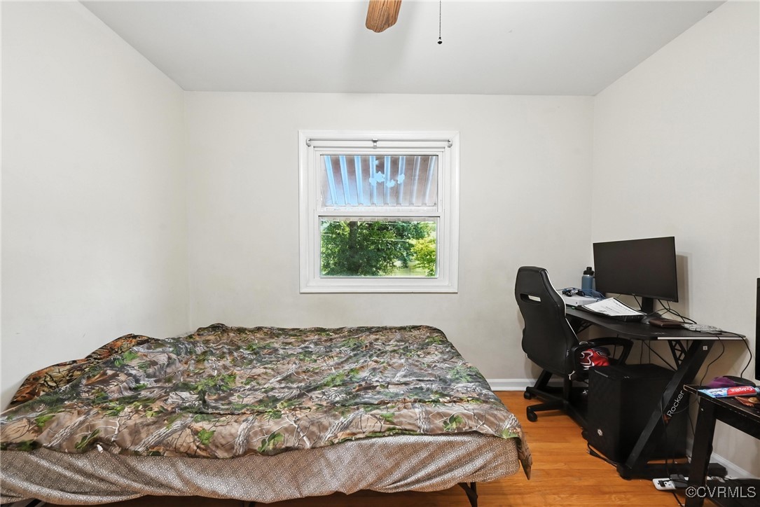 1593 Baxter Road Prince George, VA 23875 - Photo 34 of 48 a bedroom with a bed and a window