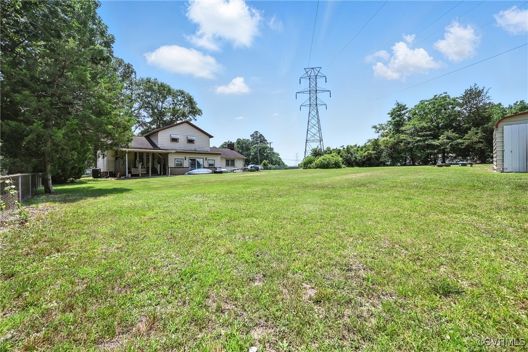 1593 Baxter Road Prince George, VA 23875 - Photo 45 of 48 a view of a big yard with a house