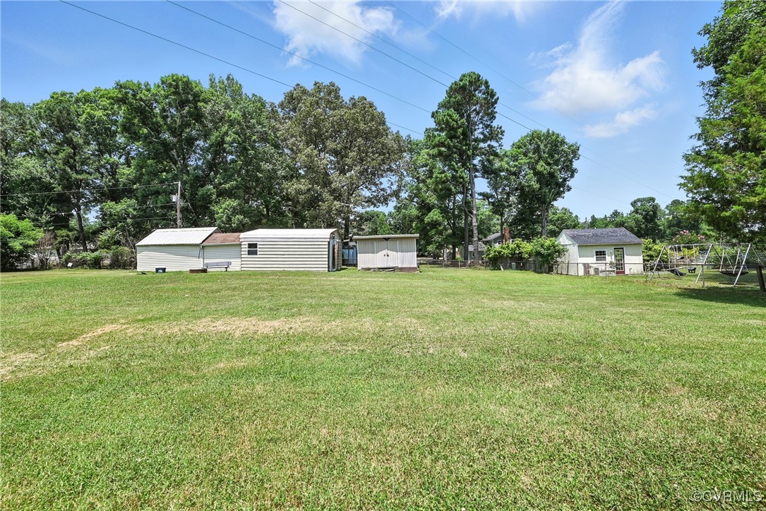 1593 Baxter Road Prince George, VA 23875 - Photo 46 of 48 a view of a house with a big yard