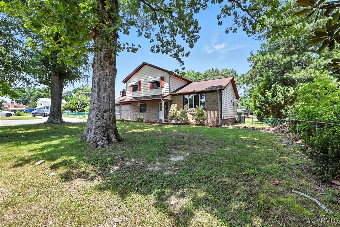 1593 Baxter Road Prince George, VA 23875 - Photo 47 of 48 a front view of a house with garden