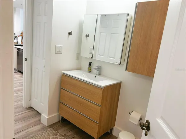 a bathroom with a shower and a toilet