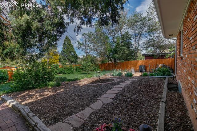 815 Cresta Road Colorado Springs, CO 80905 - Photo 28 of 30 Huge Yard with ample space and privacy for morning coffee and night cap wine
