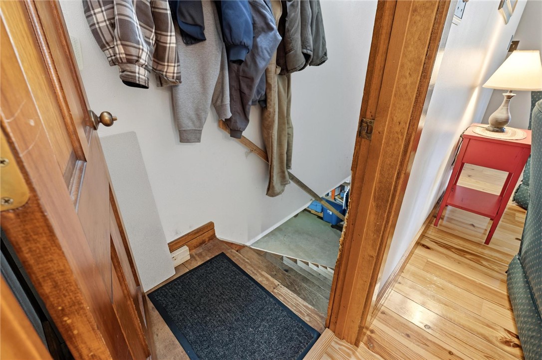4971 Lackey Road Cedarville, OH 45314 - Photo 39 of 79 This inviting entry features warm wood flooring and convenient coat hooks, welcoming all who enter.