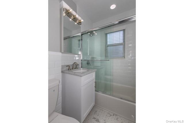 10 Laramie Road, Unit 101 West Babylon, NY 11704 - Photo 9 of 9 a bathroom with a shower and a sink