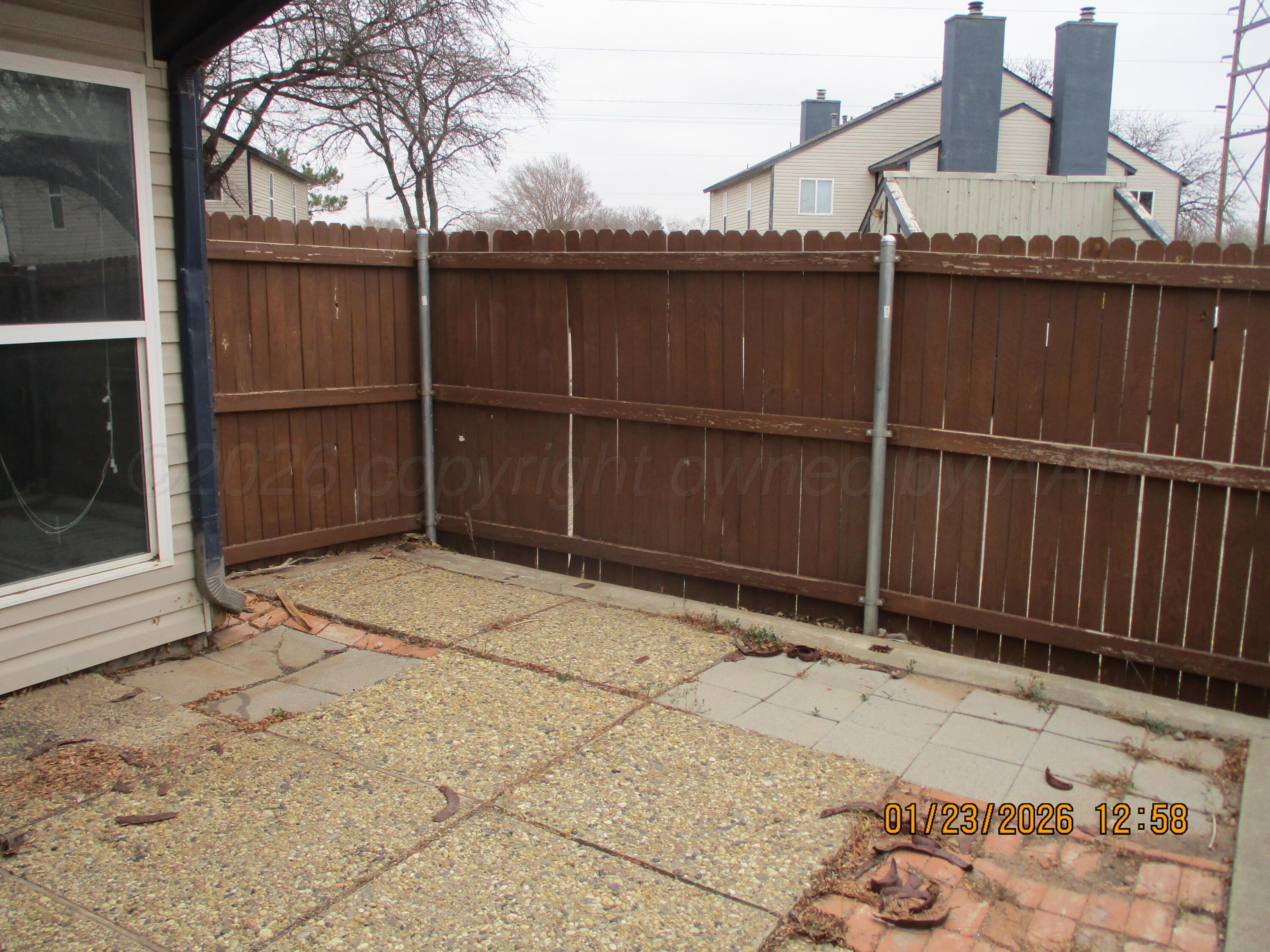 4500 South Virginia Street Amarillo, TX 79109 - Photo 2 of 8 a backyard of a house