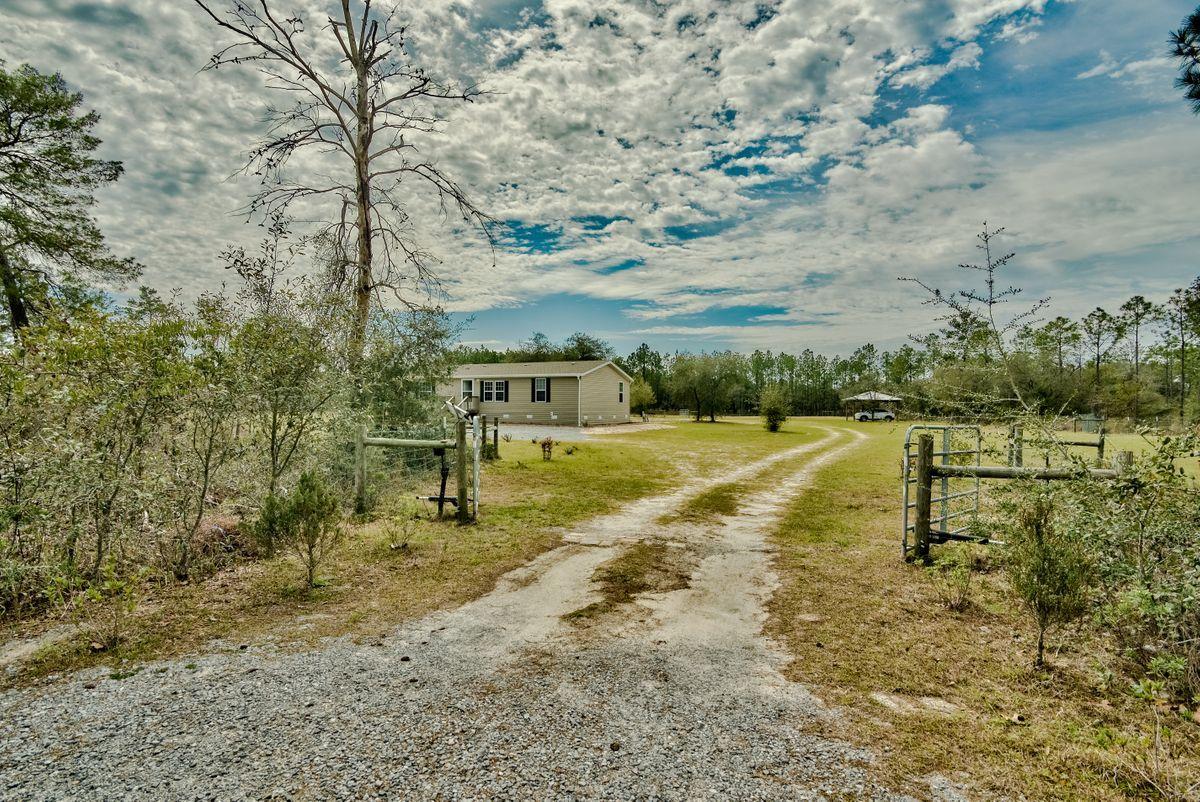 332 Don Graff Road Freeport, FL 32439 - Photo 3 of 33 a view of swimming pool with a yard