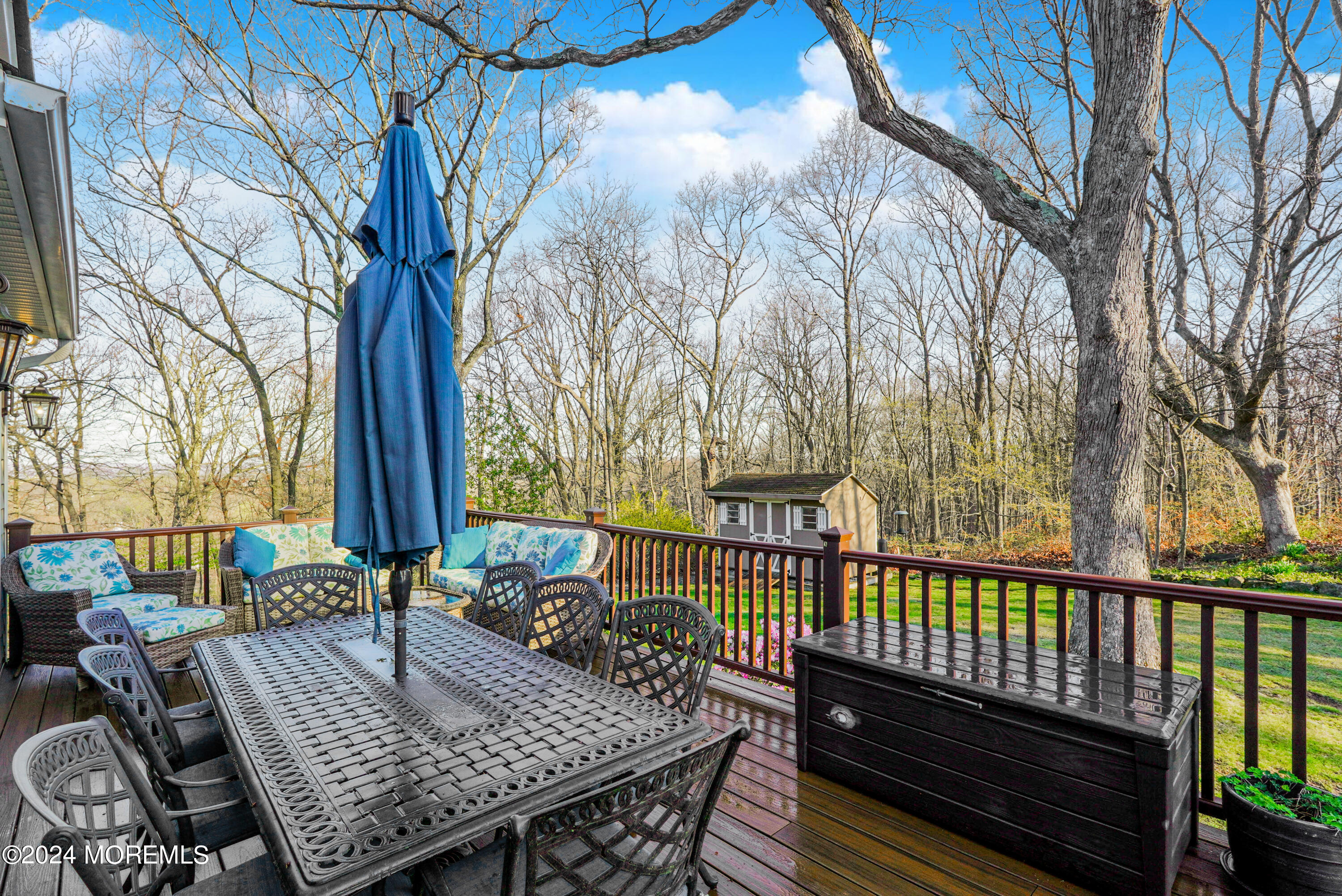 45 Center Road Randolph, NJ 07869 - Photo 17 of 43 a view of a wooden deck with furniture