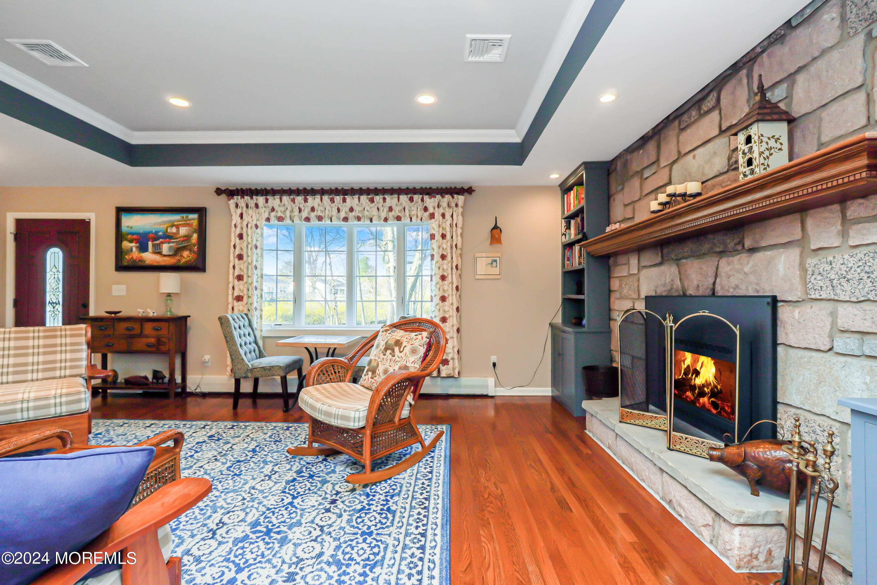 45 Center Road Randolph, NJ 07869 - Photo 7 of 43 a living room with furniture and a fireplace