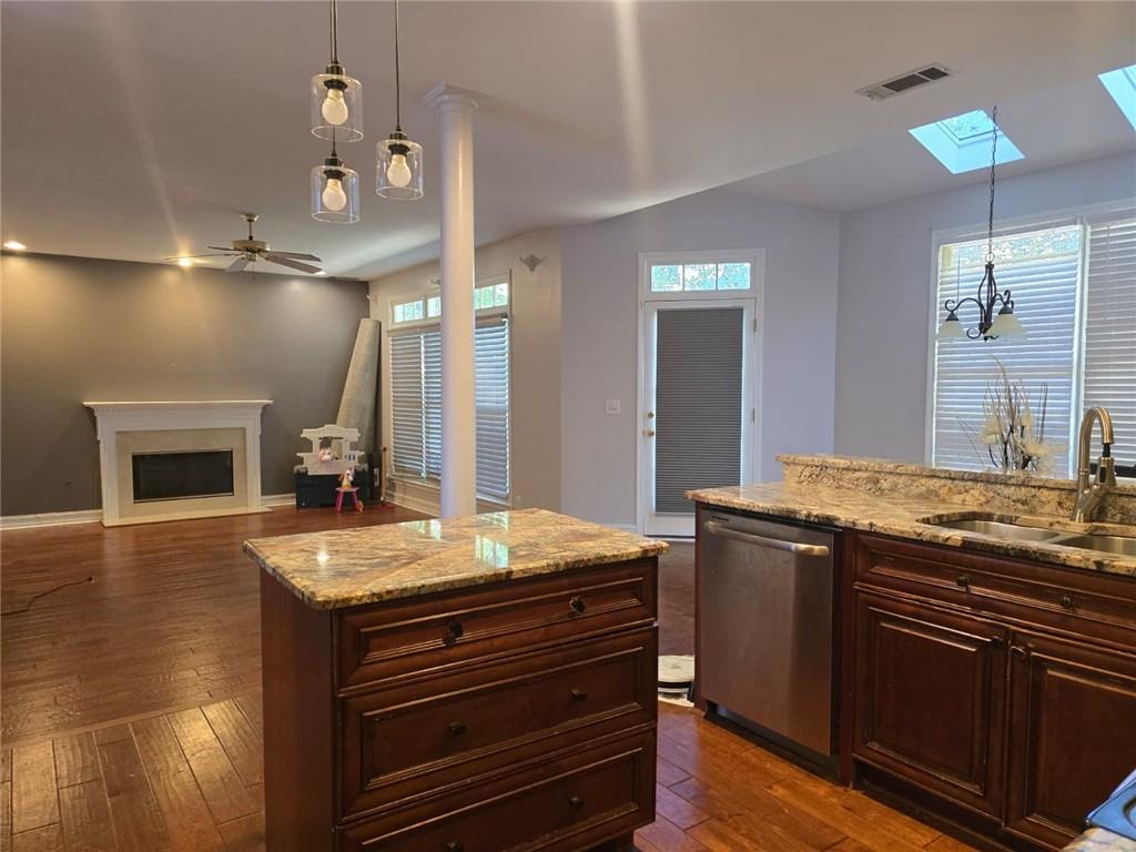 232 Spalding Gates Drive Northeast Atlanta, GA 30328 - Photo 4 of 12 a bathroom with a granite countertop sink a large mirror and a shower