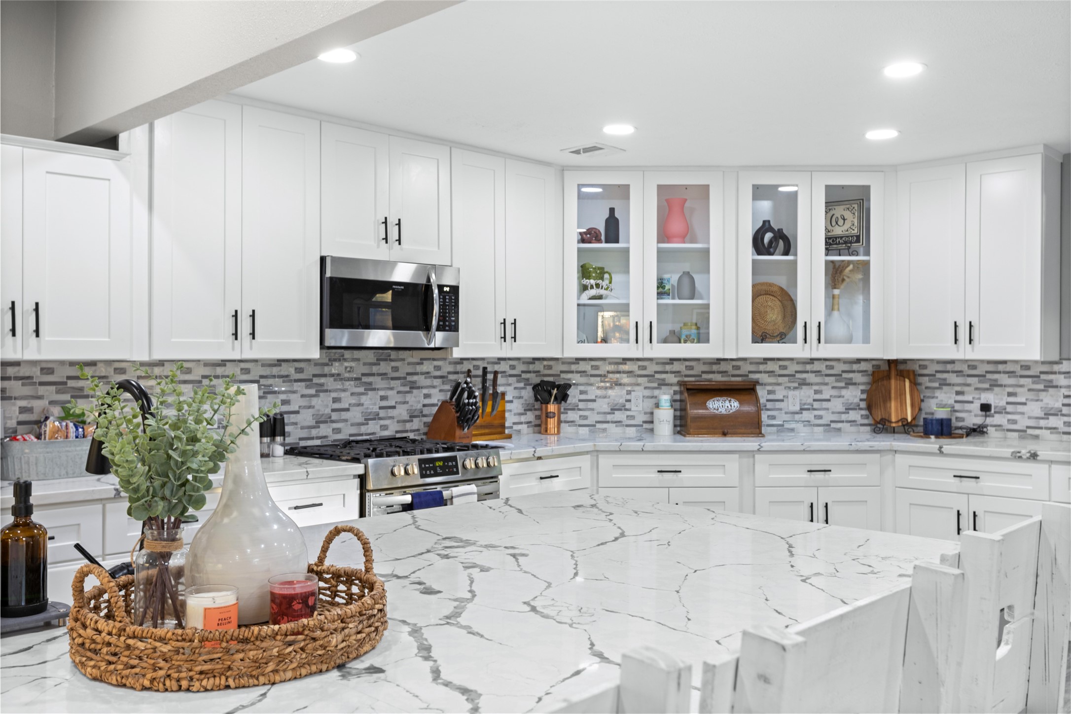 1824 Pine Cone Katy, TX 77493 - Photo 15 of 50 a kitchen with granite countertop a stove and a sink