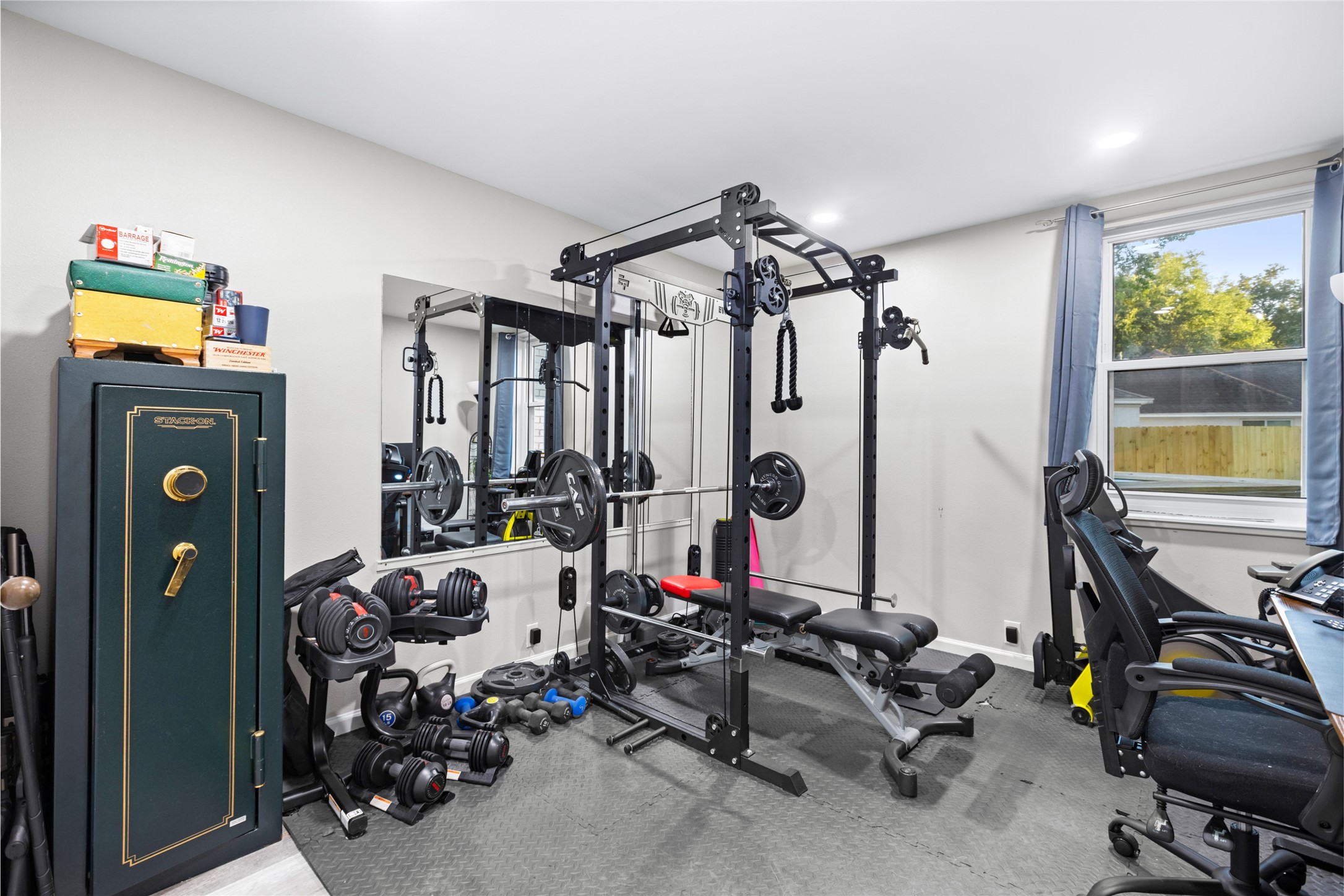 1824 Pine Cone Katy, TX 77493 - Photo 18 of 50 a view of a room with gym equipment