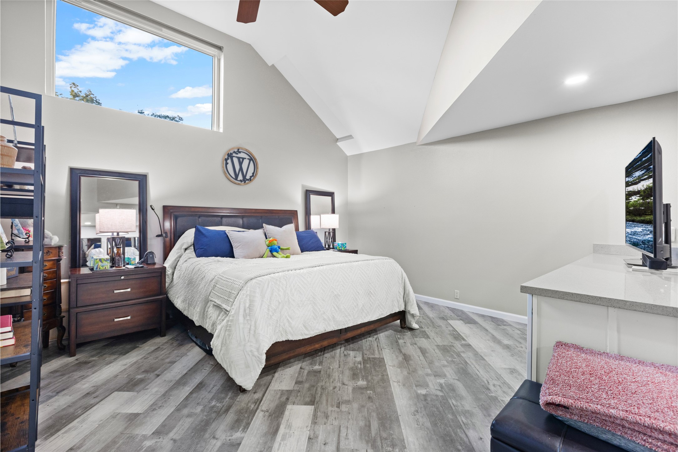 1824 Pine Cone Katy, TX 77493 - Photo 25 of 50 a bedroom with a bed and a flat screen tv