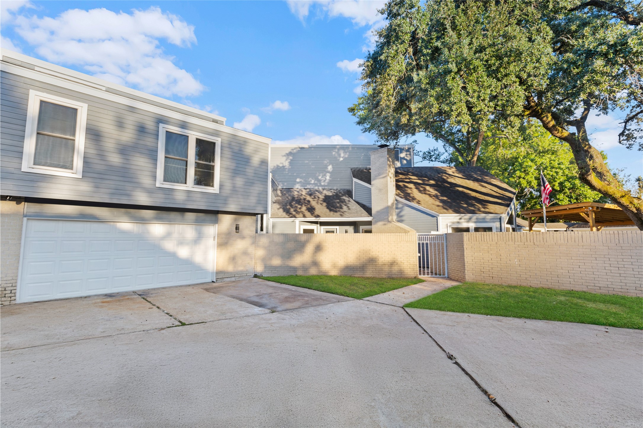 1824 Pine Cone Katy, TX 77493 - Photo 4 of 50 a view of a house with a yard and garage