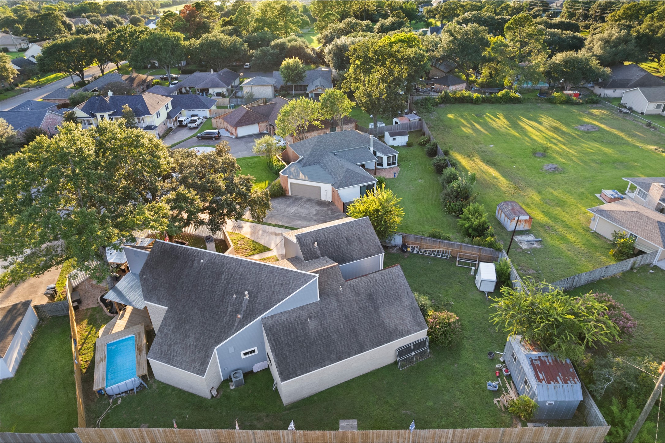 1824 Pine Cone Katy, TX 77493 - Photo 48 of 50 an aerial view of house with yard swimming pool and outdoor seating