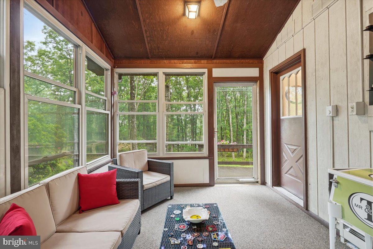 177 Jay Effort, PA 18330 - Photo 23 of 47 Serene sunroom with nature views.