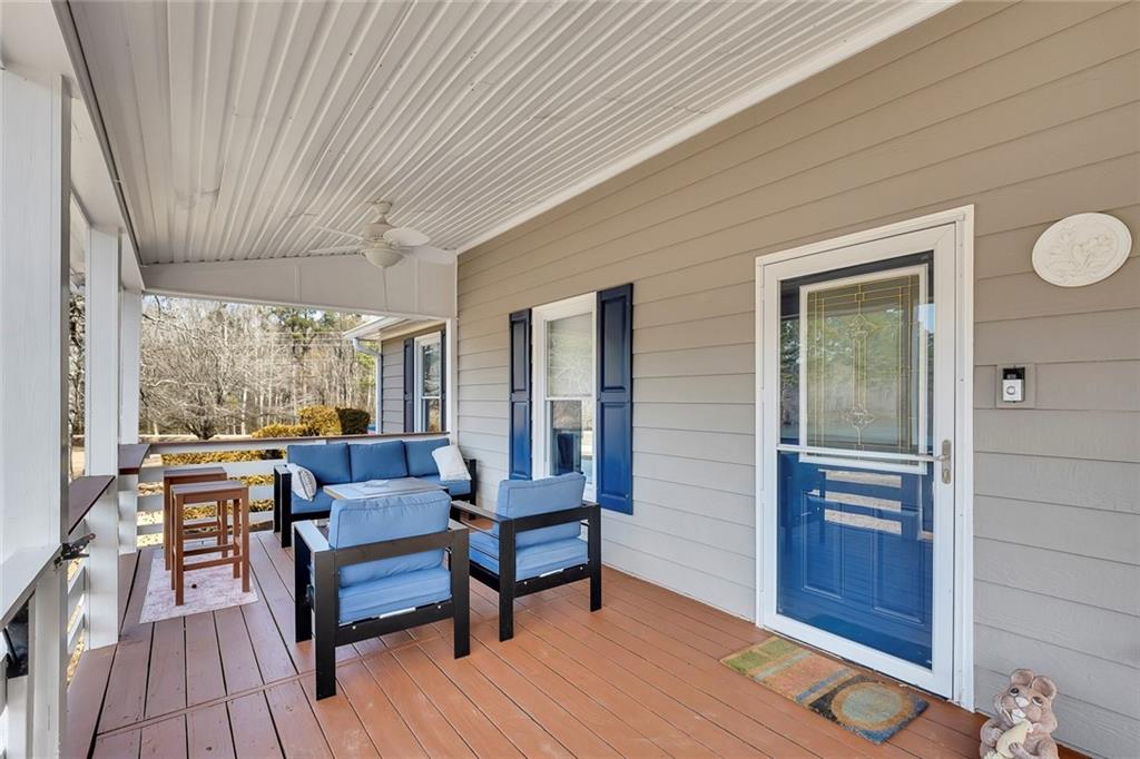 2133 Mann Road Douglasville, GA 30134 - Photo 14 of 69 a living room with furniture and a wooden floor