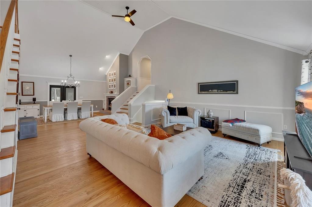 2133 Mann Road Douglasville, GA 30134 - Photo 16 of 69 a living room with furniture and a wooden floor