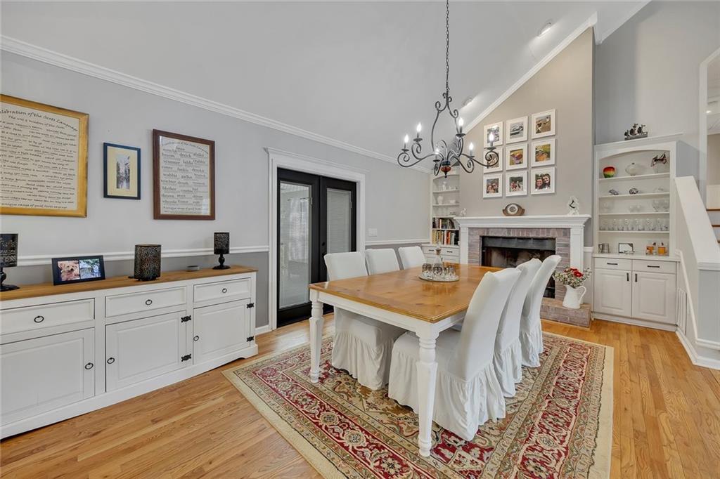 2133 Mann Road Douglasville, GA 30134 - Photo 21 of 69 a living room with stainless steel appliances furniture a fireplace and a open kitchen view