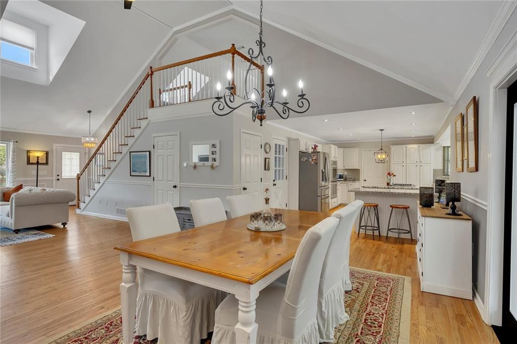 2133 Mann Road Douglasville, GA 30134 - Photo 22 of 69 a view of a dining room with furniture and wooden floor