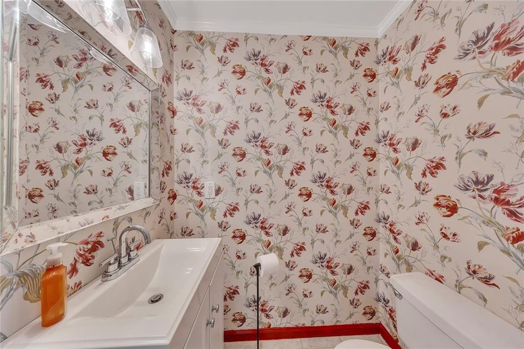 2133 Mann Road Douglasville, GA 30134 - Photo 28 of 69 a bathroom with a sink and a shower curtain