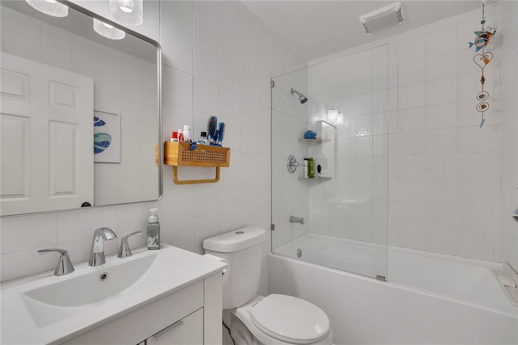 2133 Mann Road Douglasville, GA 30134 - Photo 31 of 69 a bathroom with a sink toilet and bathtub