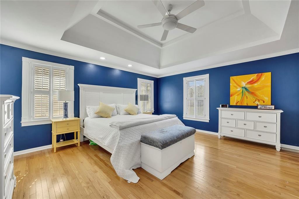 2133 Mann Road Douglasville, GA 30134 - Photo 32 of 69 a bedroom with a bed and a flat screen tv