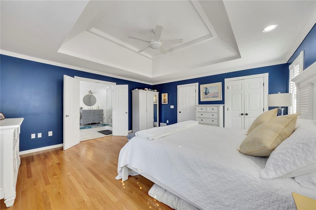 2133 Mann Road Douglasville, GA 30134 - Photo 34 of 69 a bedroom with a large bed and a large window