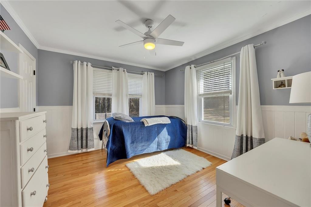 2133 Mann Road Douglasville, GA 30134 - Photo 40 of 69 a living room with furniture and a fireplace